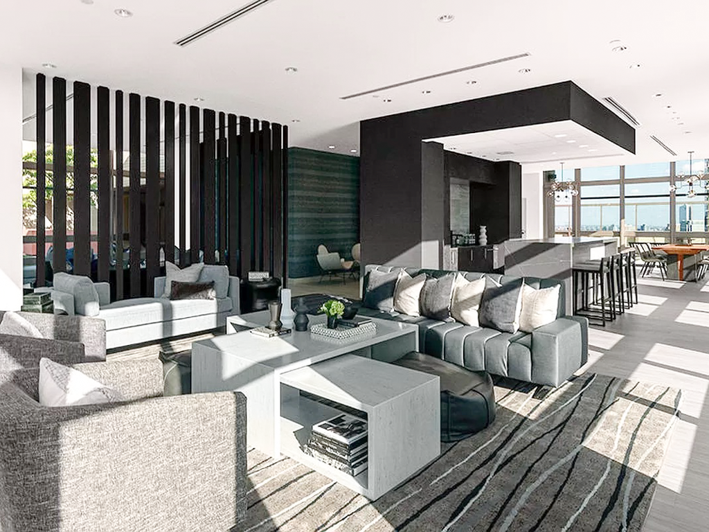 Luxury apartments for rent in the Financial District. photo shows tenant lounge.